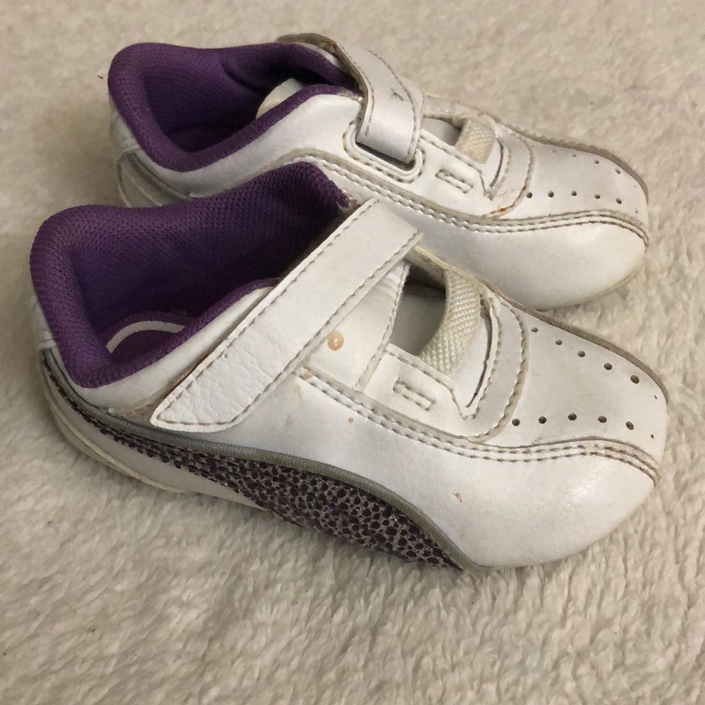 White and purple pumas